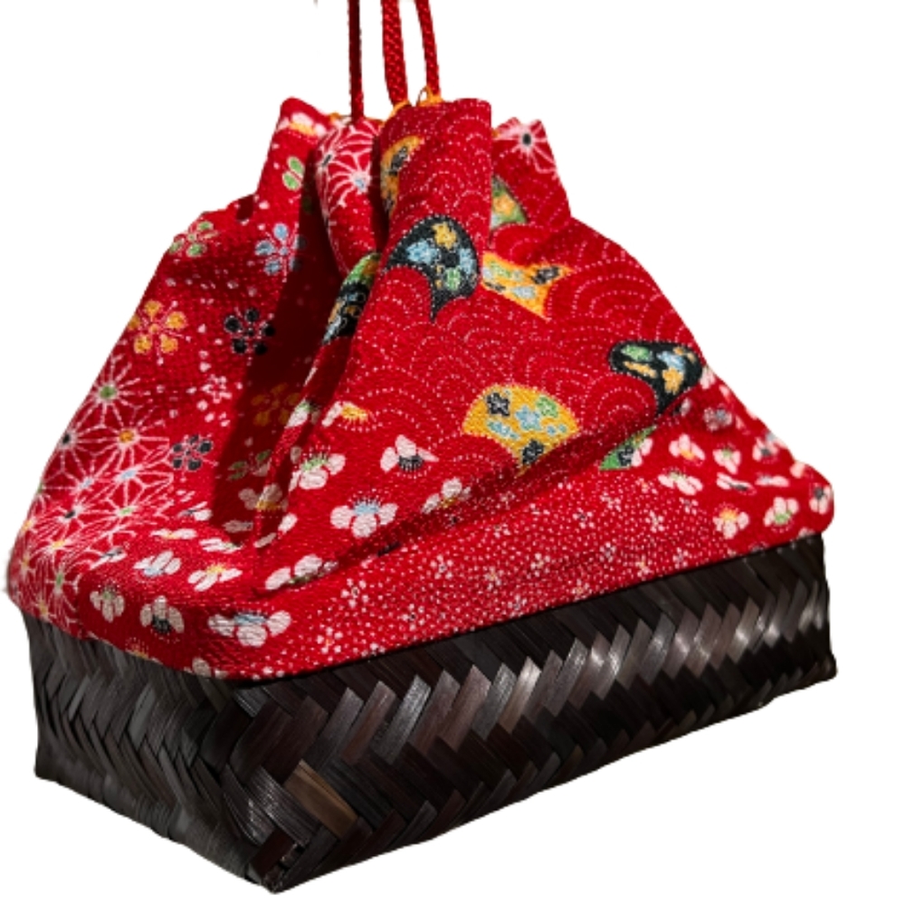 Sakura draw string bag with sturdy rattan base